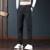 Pantalones Casuales Nuevos para Hombre Primavera y Otoño Sueltos Rectos Elásticos Pantalones de Vestir Simples Versátiles Anti-Arrugas