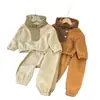 Conjunto patchwork personalizado para niños, nueva colección de invierno 2025, sudadera con capucha y pantalón de chándal color block de forro polar unisex, estilo coreano