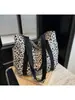 2026 Nueva Bolsa de Lona con Estampado de Leopardo para Mujer Bolso de Hombro de Gran Capacidad Bolsa de Compras para Estudiantes y Viajeros Fábrica