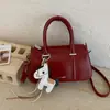 Moda Transfronteiriça Versátil Grande Capacidade Primavera 2026 Nova Tendência Bolsa de Ombro Transversal com Toque de Luxo e Bolsa Almofada de Mão