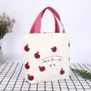 Bolso lindo de estilo caricatura nuevo para mujer, una opción elegante y moderna para mamás que salen o van al trabajo, con un diseño japonés y un tamaño pequeño adecuado para llevar el almuerzo.