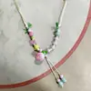 Collar con colgante de campana de mariposa de cerámica de estilo étnico retro para mujer, diseño nuevo y moderno, cadena larga para suéter, accesorios