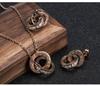 Collar de Acero de Titanio de Venta Caliente Europeo y Americano Colgante Eternal Anillo Doble Corrosión Números Romanos Clavícula Mujeres Aretes de Acero Inoxidable
