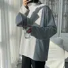 Camiseta básica de cuello medio para hombre, moda primavera y otoño, marca, suéter a rayas, estilo Hong Kong, Harajuku, interior suelto, camiseta de manga larga