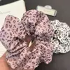 Faixa de Cabelo Retro Americana com Estampa de Leopardo para Mulheres Novo Estilo 2025 Corda de Cabelo Personalizada de Alta Qualidade Acessório de Cabelo Grande de Alta Elasticidade