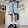 Conjunto de moda de verano nuevo y moderno con diseño de remaches, versátil, holgado, transpirable, conjunto casual de dos piezas de manga corta y shorts