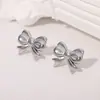 Brincos de Aço Inoxidável em Forma de Laço Estilo Coreano Exquisitos e Simples Ins Elegantes de Aço de Titânio 18K Não Descolorantes Atacado para Mulheres