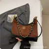 Bolso de mano pequeño de estilo fragancia exquisita con diseño de rejilla cruzada para mujer 2026 nuevo bolso bandolera de cadena de alta gama bolso de hombro único retro