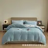 Conjunto de cama de alta qualidade para bebês em fleece de outono e inverno de Nantong, grau A, adequado para mães e bebês, com um conjunto de quatro peças feito de tecido macio de fleece de leite