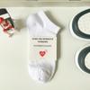 Calcetines de primavera y otoño para hombre, de color liso, en blanco y negro, modernos, transpirables, con diseño de panal, para estudiantes, monopatín, deportivos, largos, de baloncesto y cortos.