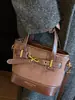 Bolsa de mão de nicho de luxo leve transfronteiriça feminina novo estilo outono 2026 bolsa de balde moderna bolsa de ombro único transversal texturizada