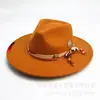 Tendencia de personalidad de la moda europea y americana transfronteriza sombrero de fieltro diseño original sombrero fedora temperamento británico sombrero de lana outlet de fábrica