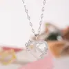 Collar Colgante de 26 Letras Flor Corazón Moda Nueva 2026 Transfronterizo Europeo y Americano Joyería de Alta Gama de Nicho