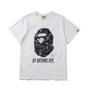 Comercio Exterior Transfronterizo Marca Japonesa de Moda Camuflaje Cabeza de Mono Bloques de Color Resplandor en la Oscuridad Manga Corta Pareja Holgada Camiseta Pe Camiseta de Manga Corta