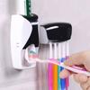 Espremedor de pasta de dente colorido totalmente automático sem perfuração Suporte de armazenamento de escova de dentes montado na parede Conjunto criativo de espremedor de pasta de dente preguiçoso