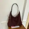 Bolsa tote grande de estilo coreano vintage transfronteiriça para mulheres, bolsa simples mãe e filha outono 2026, bolsa de ombro e axila para o dia a dia