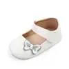 Zapatos de princesa nuevos de primavera y verano con lazo de purpurina suela de goma para niña pequeña zapatos de bebé zapatos de bebé al por mayor total 2572