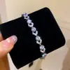 Pulsera con cierre de círculo de circonita transfronteriza europea y americana, sensación de lujo ligero de alta gama, joyería versátil exquisita para mujer para el día a día, venta al por mayor