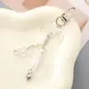 Nuevo llavero con lazo acrílico, colgante con personalidad, colgante para bolso, funda para auriculares, cadena, joyería