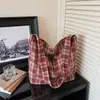 Bolsa Balde de Lã Versátil Xadrez Pied-de-poule Retrô para Mulheres 2026 Novo Estilo Artístico Casual com Textura para Ombro e Transversal