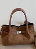Bolso Retro de Alto Valor Nuevo Estilo Otoño 2026 Popular Exquisito Color Sólido Viaje Cotidiano Sensación Relajada Bolso Pequeño Cuadrado de Hombro Único