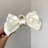 Presilha de Cabelo Princesa em Fuga Presilha Garra com Laço Preto Tamanho Grande Acessório de Cabelo para Nuca Presilha Tubarão Presilha de Cabelo