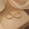 Pendientes de concha con borlas frescos y elegantes, pendientes con sentido de diseño para mujer, nuevos pendientes de botón de primavera y verano, venta al por mayor
