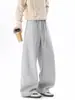 Pantalones deportivos de chándal anchos de retazos de moda para hombre, estilo callejero americano, para primavera y otoño, pantalones casuales rectos de color liso de moda