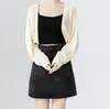 Protección Solar Hilo de Hielo Delgado Cárdigan de Gama Alta para Mujer Verano Nuevo Estilo Hueco Exterior Chal de Punto Falda con Tirantes Top Corto