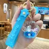 Llavero de pez dorado pequeño flotante para hombres y mujeres, exquisito, lindo, colgante de llavero de coche de botella flotante, colgante de bolso, pequeño regalo