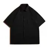 Camisa Casual Masculina de Manga Curta Fresca para o Verão 2026 Nova Tendência Versátil Confortável Top de Manga Curta com Bolso Único Tendência