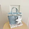 Bolsa feminina simples e estilosa, bolsa transversal texturizada de ombro único da moda 2026, bolsa de mão xadrez casual nova, bolsa da moda