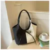 Bolso tote de gran capacidad para mujer, nuevo modelo de verano 2025, bolso simple casual para el hombro estilo ins, bolso versátil de moda para mujer