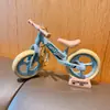 Llavero colgante de pareja de bicicletas de dibujos animados, creativo, divertido, móvil y deslizante, pequeño regalo, decoración