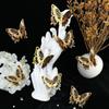Una variedad de nuevas y creativas pegatinas de pared de mariposas doradas tridimensionales 3D, 12 pegatinas de pared decorativas autoadhesivas para sala de estar instaladas