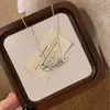 Nuevo Estilo "El Dinero Llega al Instante" Collar Triturado en Oro y Plata, Joyería de Nicho Versátil de Alta Gama para el Año de Nacimiento, Idea de Regalo