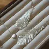 Pendientes de Borla de Pluma de Cisne Hechos a Mano con Cuentas Estilo Hada Tejidos Pendientes Largos Pendientes Ligeros de Lujo para Damas