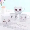 Plato Creativo de Dibujos Animados Estilo Japonés Taza de Cerámica Linda Taza de Leche Taza Taza de Café con Platillo Cara Sonriente Personalizada Esmalte