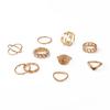 Anillo de Perlas Calientes Transfronterizo Juego de Anillos de Perlas Estilo Punk Europeo y Americano Juego de 10 Piezas Anillo Abierto Hueco Dorado