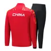 Traje Deportivo Casual de Dos Piezas con Mangas Largas y Cuello Alto del Equipo Chino Primavera y Otoño Cremallera para Hombres y Mujeres Chaqueta de Moda