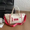 Bolsa de lona transfronteriza para mujer, bolsa de gran capacidad para el día a día, nuevo bolso de mano casual versión coreana para el verano 2026, bolso de hombro y cruzado
