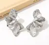 Pendientes de botón de hoja irregulares exagerados transfronterizos, Pendientes exquisitos de moda, Accesorios para orejas de nicho vintage de alta gama de lujo ligero al por mayor