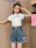 Shorts Jeans Femininos Infantil Verão 2025 Novo Calça Cinco Pontos para Crianças Mais Velhas Casual Moderno Estiloso Atacado