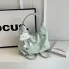 Bolsa feminina de grande capacidade primavera-verão 2026 nova moda mochila para trabalho bolsa de ombro única tipo balde tote bag