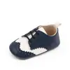Zapatos para bebé británicos primavera y otoño nuevos zapatos para bebé de suela blanda zapatos para niño pequeño zapatos para bebé 2805