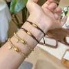 Bolso Estilo Libro Rojo Pequeño, Baguette de Cuerda de Cuero Trenzada de Gato, Pulsera Arena Dorada para Mujer, Regalo para Novia, Artículo Popular de Celebridad de Internet