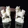 Pedal de Pie de Boj Adornos Xiangyun Kirin Bestia Auspiciosa Antigua Kirin Madera Maciza Tallado de Una Pieza Decoraciones para Sala de Estar China