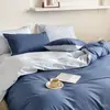 Juego de ropa de cama de algodón 100% de grado A para maternidad e infantil, juego de cuatro piezas de algodón puro con un diseño de dos tonos simple y de alta gama, que incluye funda de edredón, sábana plana y sábana bajera