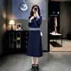 Conjunto de punto de moda estilo universitario coreano para mujer, nuevo modelo otoño e invierno 2026, top y falda, conjunto de dos piezas a la moda