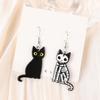Aretes acrílicos de doble cara de Halloween de calavera y gato blanco y negro de venta caliente transfronteriza terminados